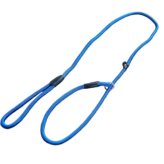 Blue dog leash with black clips on a textured gray surface