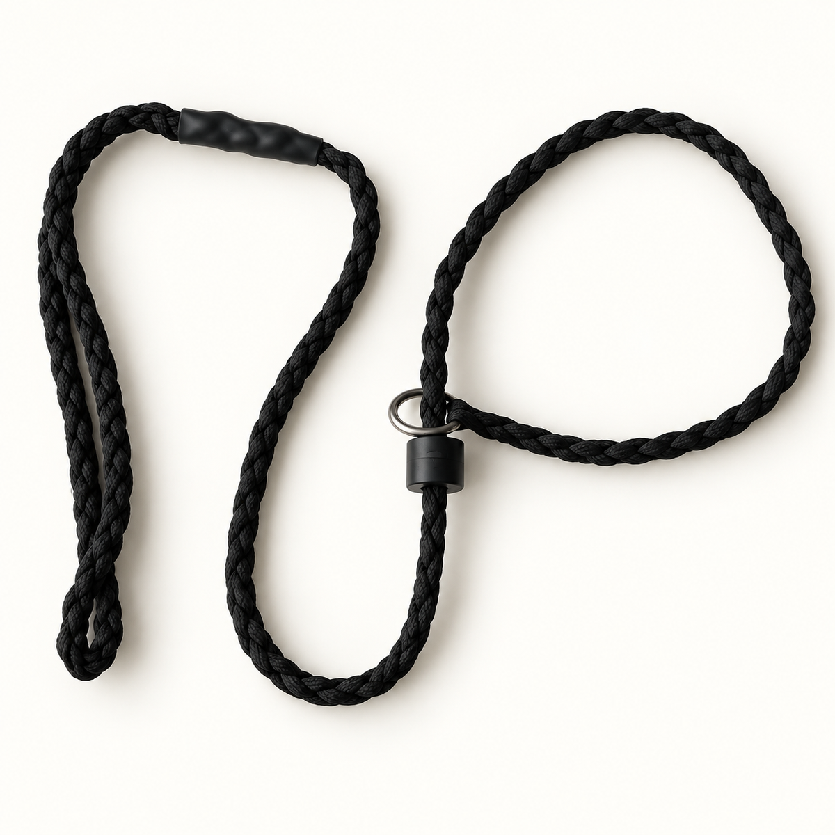 A black braided rope leash with a black plastic snap connector and a silver metal ring, laid out on a clean white background.