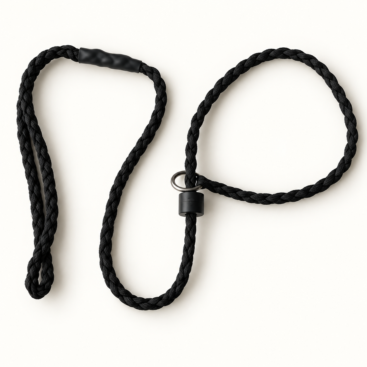 A black braided rope leash with a black plastic snap connector and a silver metal ring, laid out on a clean white background.